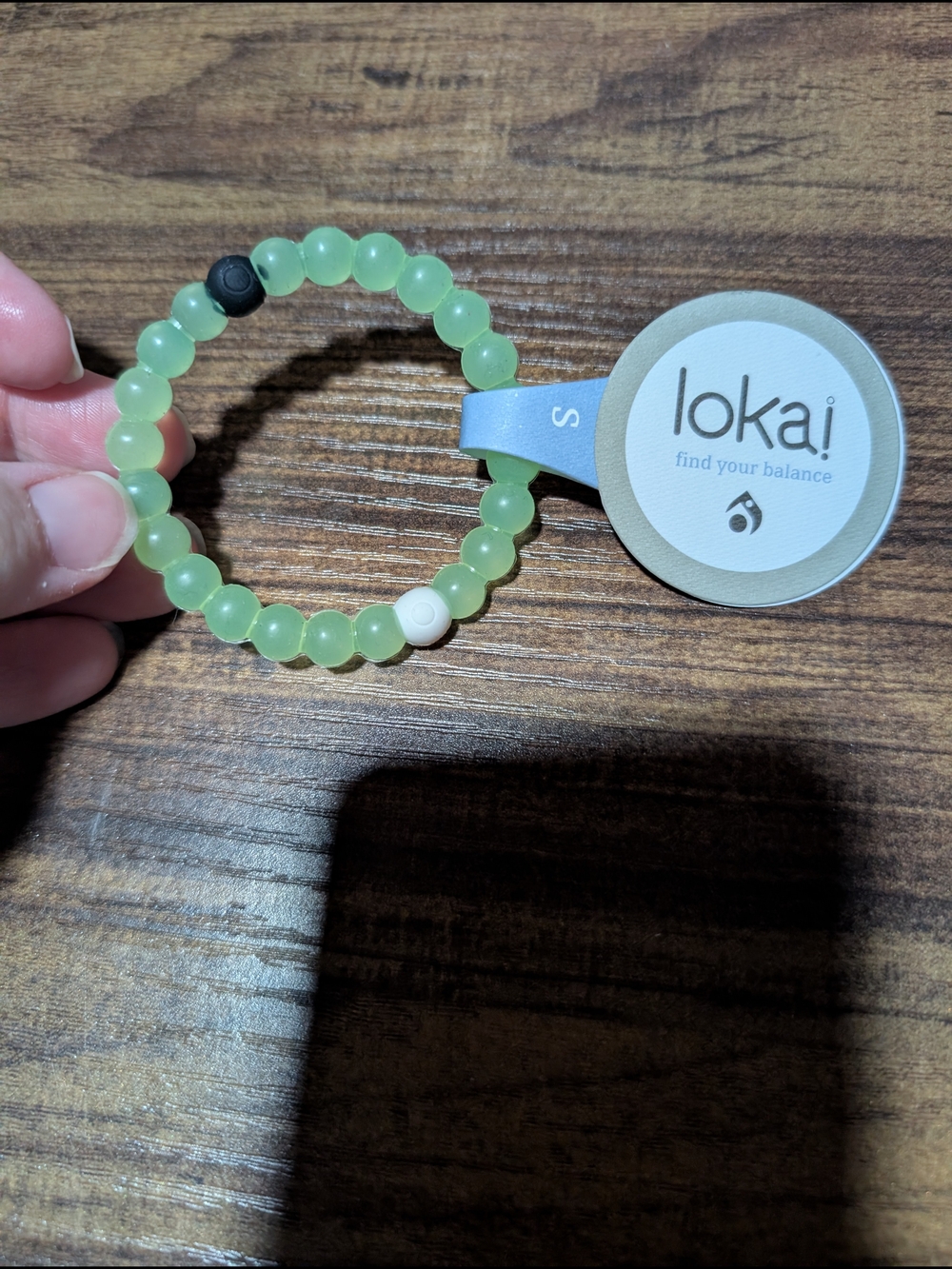 Lokai Light Green Beaded Bracelet with Black and White Accent Beads